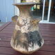 Vase vintage décor animaux préhistoire signé Armen