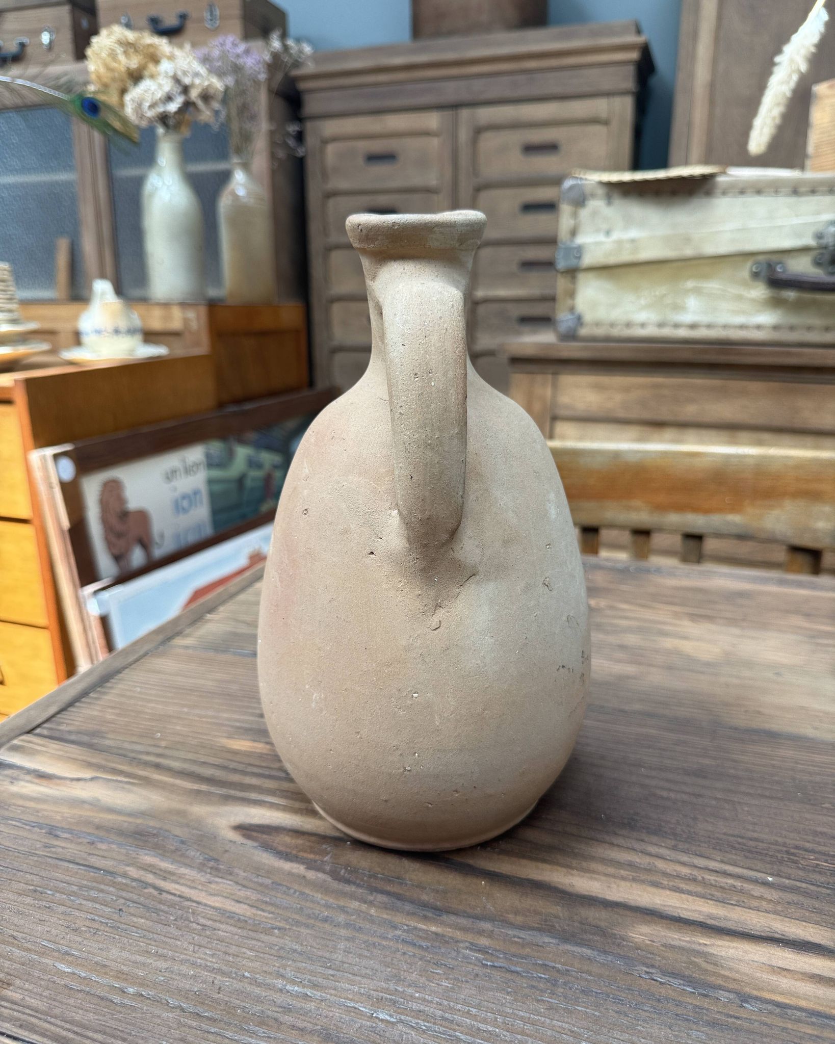 Unfired clay pitcher
