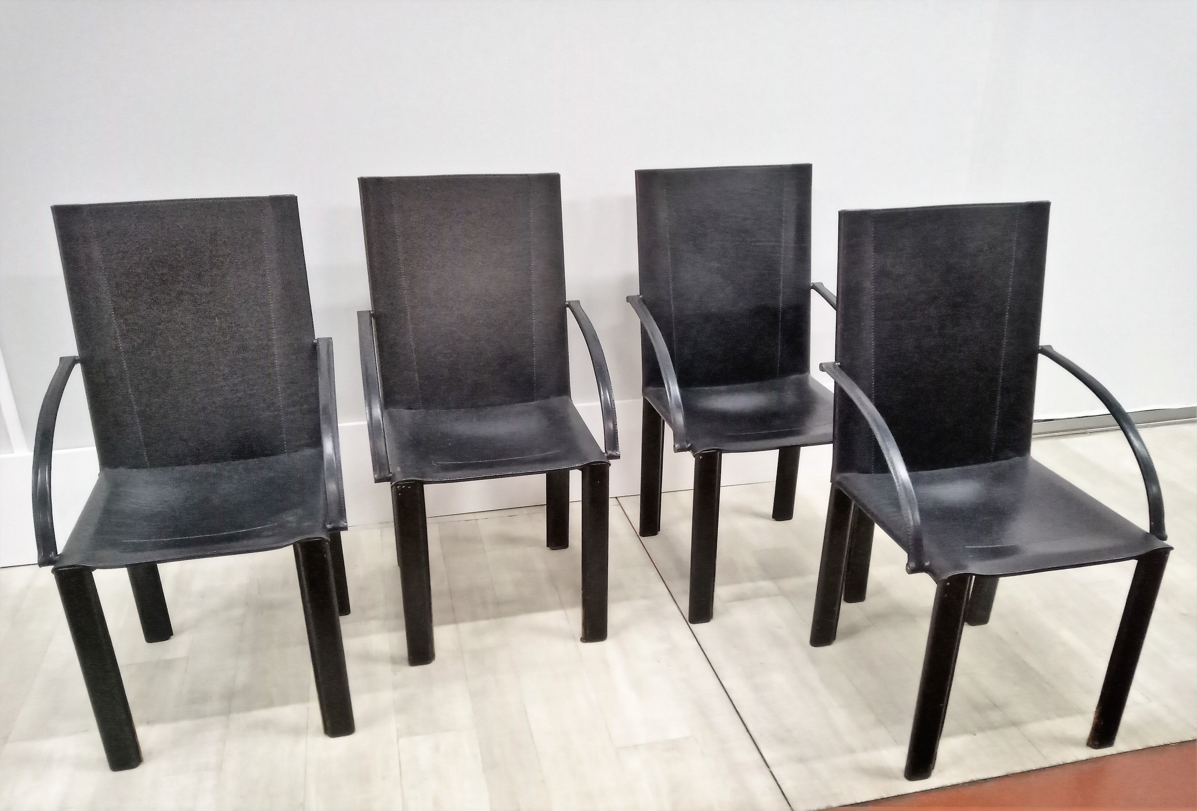 Black leather coral chairs by Matteo Grassi