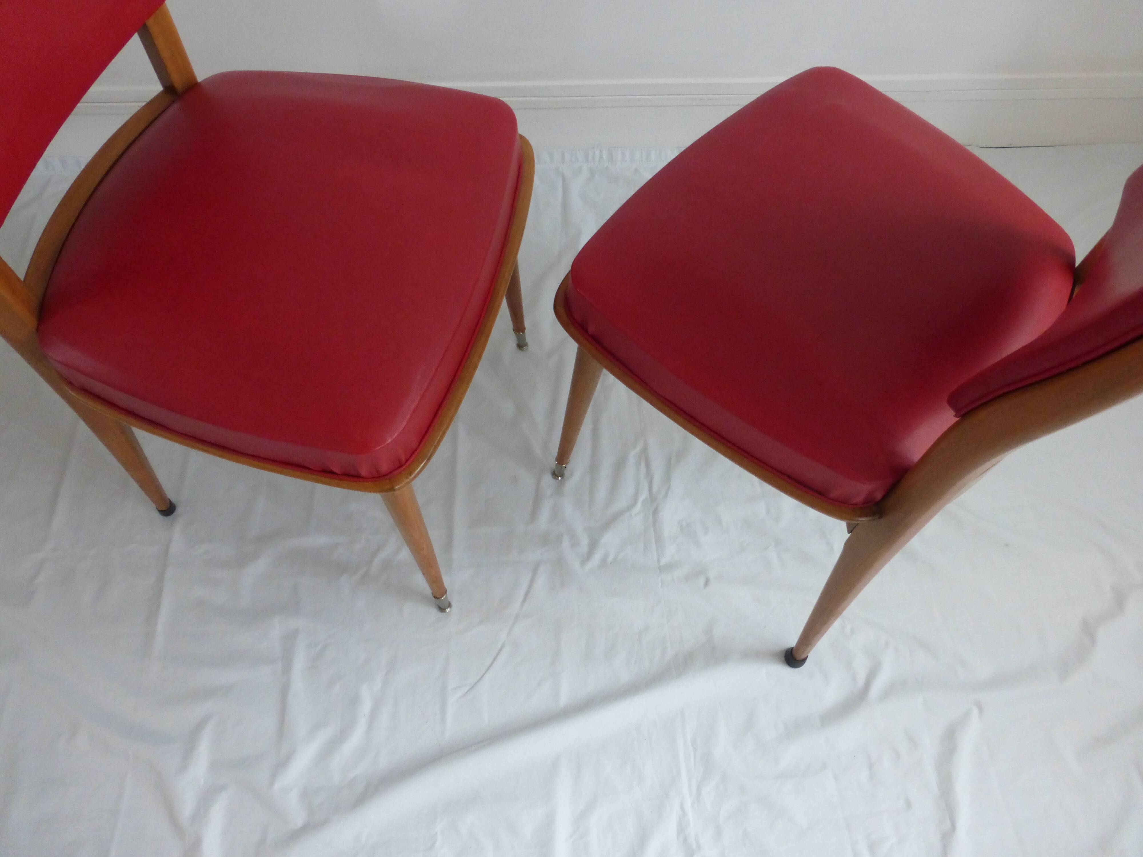 Set of five 50s wooden and red skai chairs