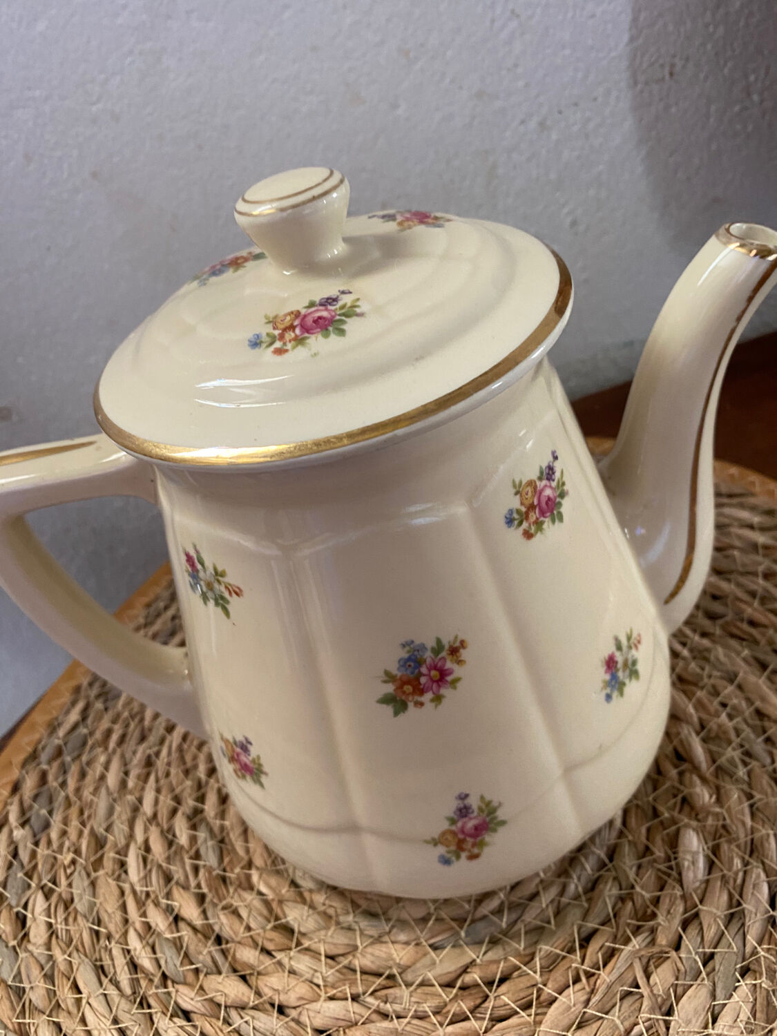 Old teapot or coffee maker in English style.