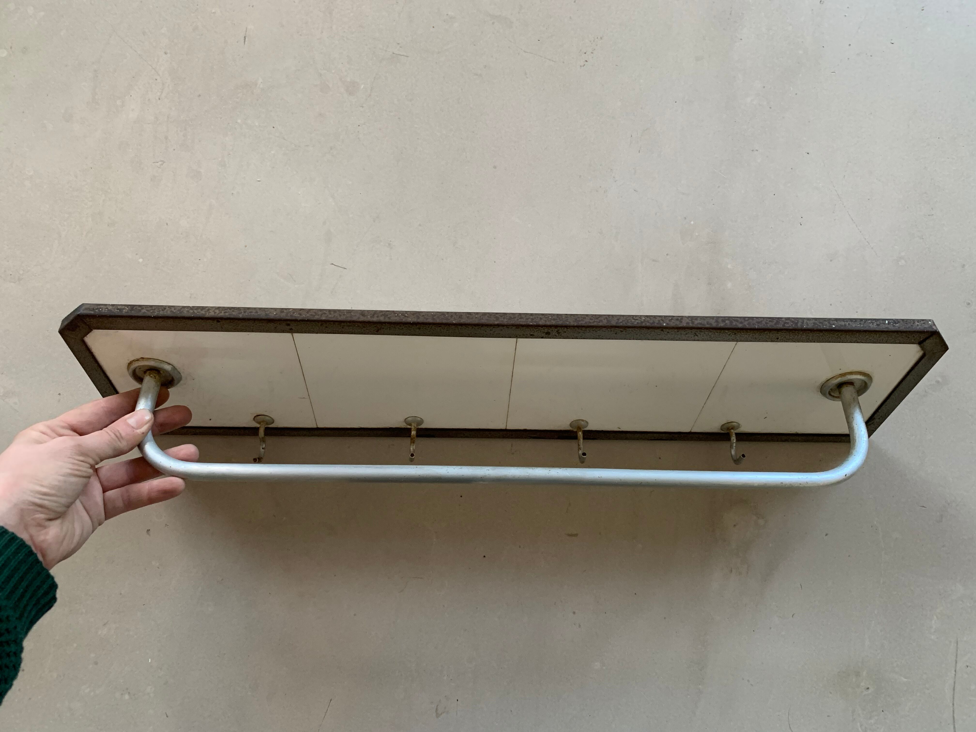 Antique tiled tea towel holder