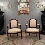 Pair of walnut armchairs from the Louis XVI period around 1770