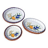 Set of 3 vintage ceramic dishes with wicker baskets.