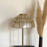 Table lamps with a lampshade with mother-of-pearl set with checkerboard brass and a gilded foot