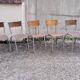 Set of 9 mismatched old school chairs