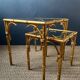 Pair of nesting tables in faux bamboo with glass tops, France, 1960s.