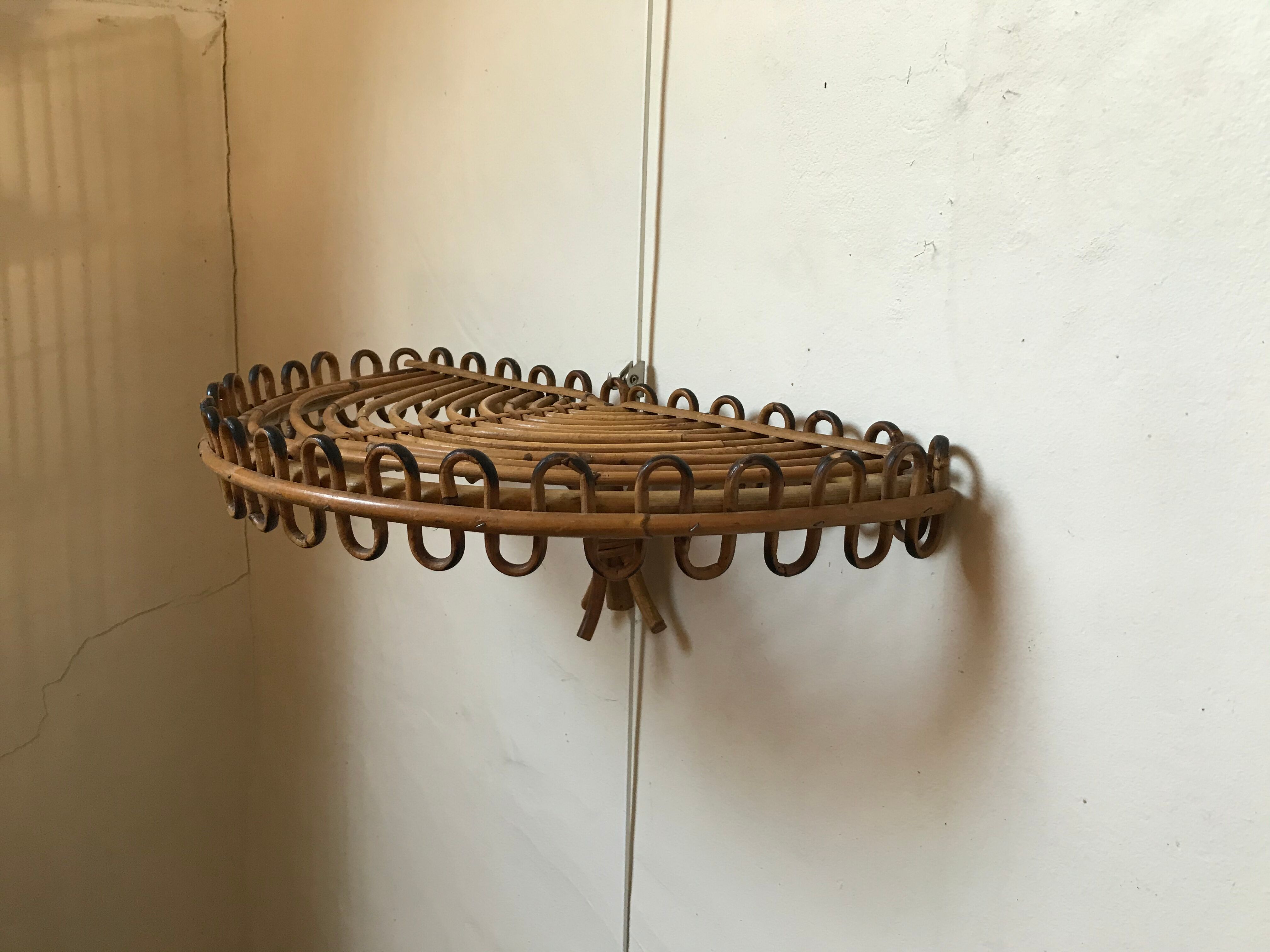 Rattan wall shelf