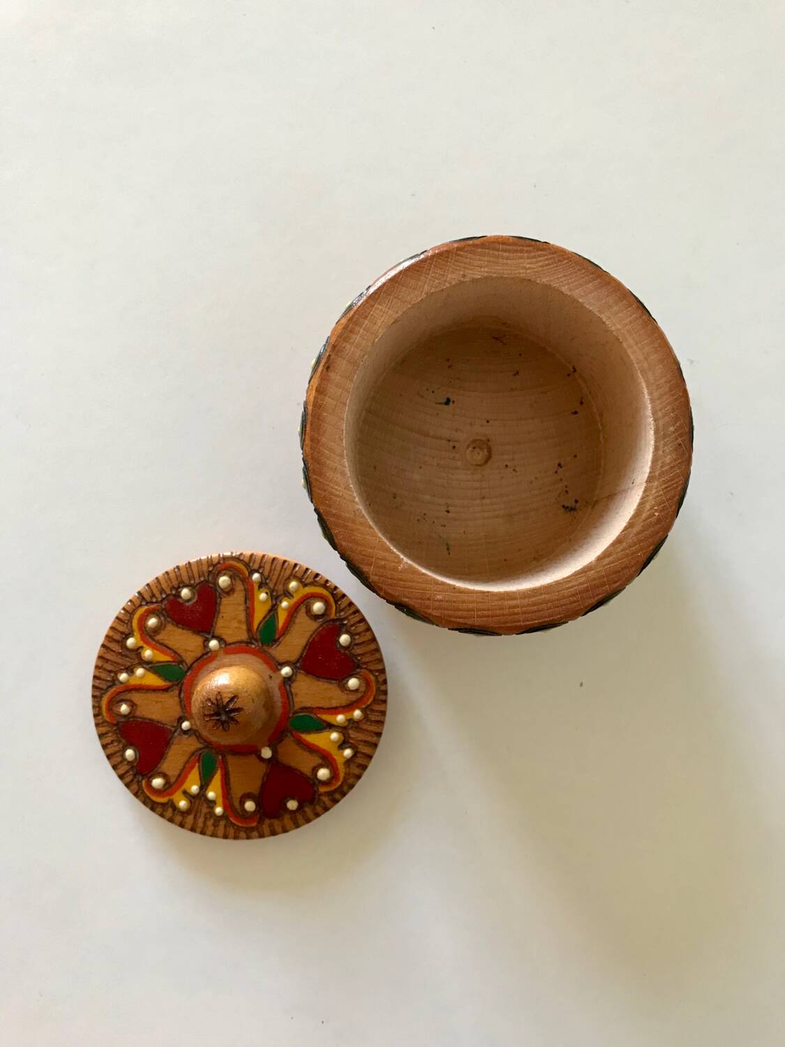 Vintage small round box with lid in light wood carved in relief decorated painted