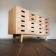 Merchandising chest of drawers by James Leonard Esavian