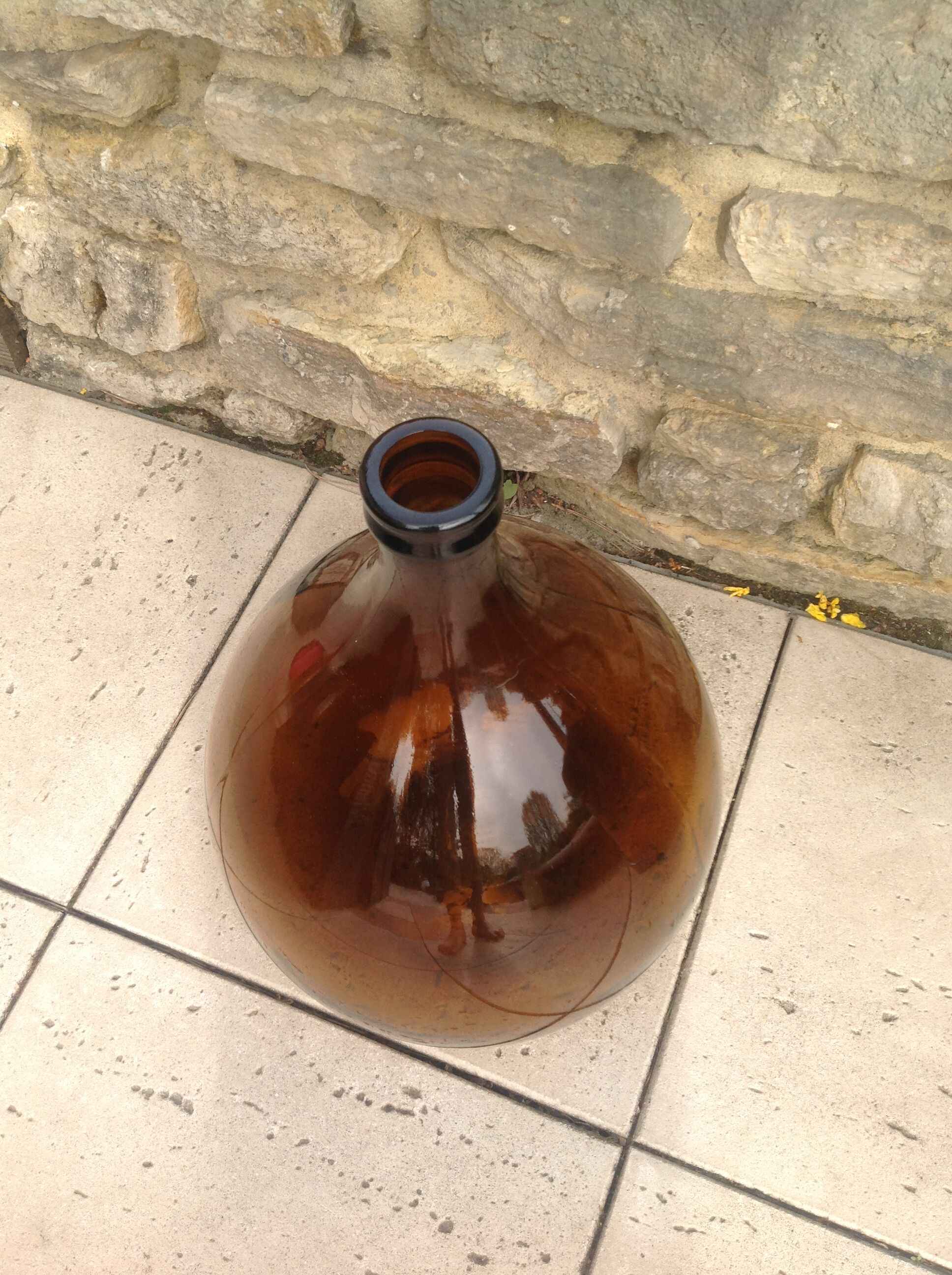 Old demijohn bonbonne smoked glass