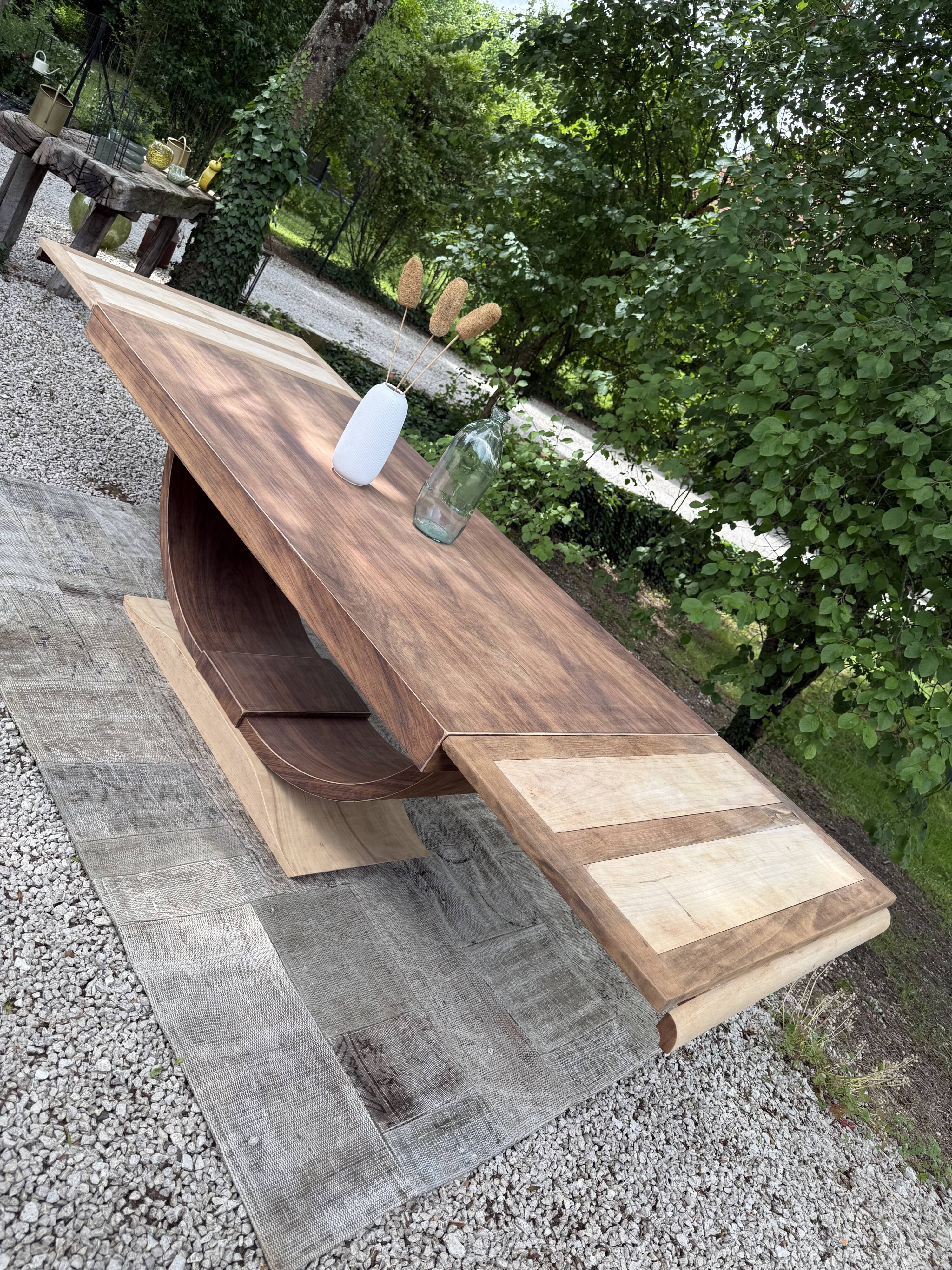 Renovated wooden table with extensions.