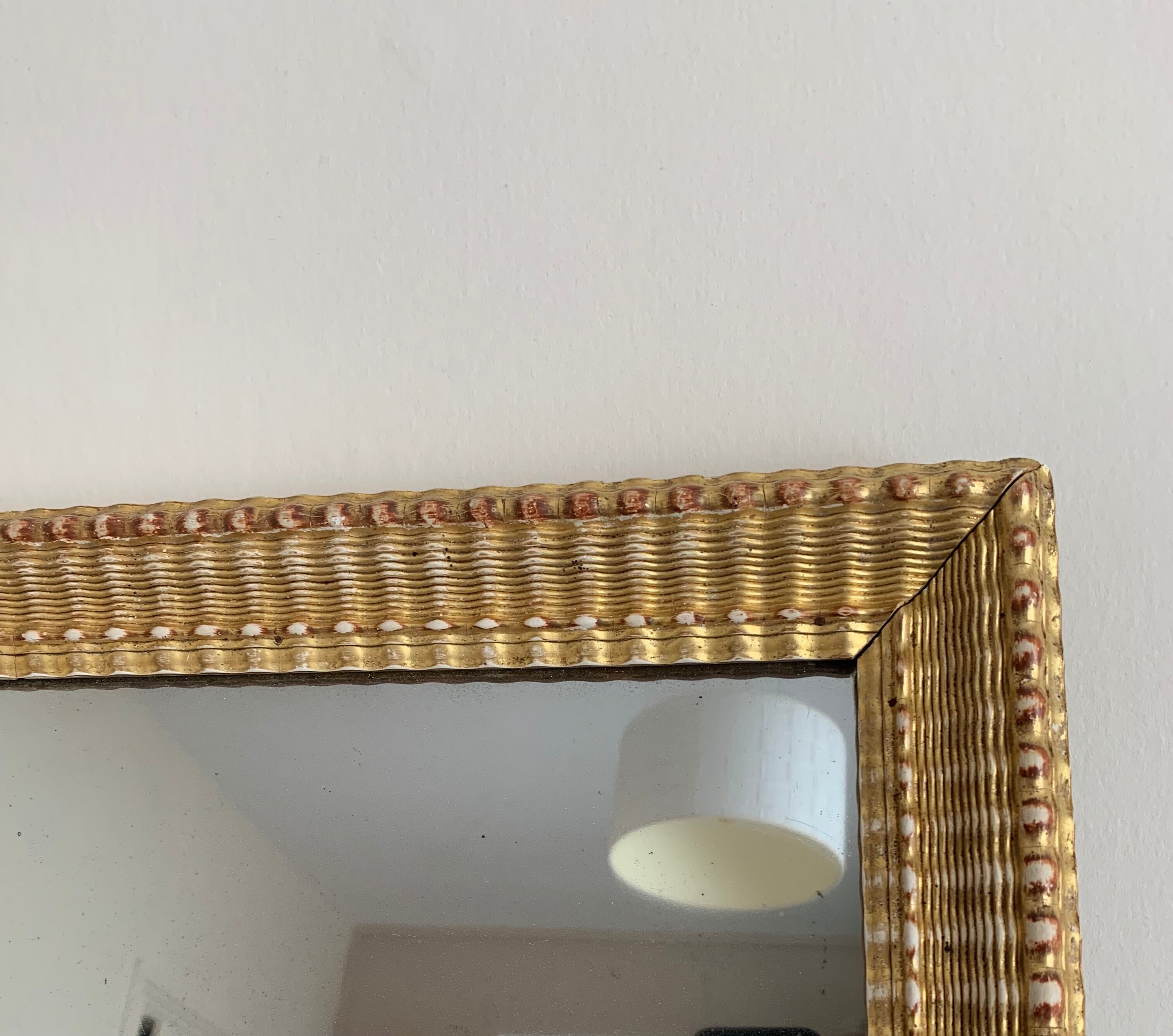 Carved and gilded wooden mirror  44x56cm