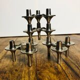 Modular chrome metal candle holders by Nagel & Stoffi. Set of 4