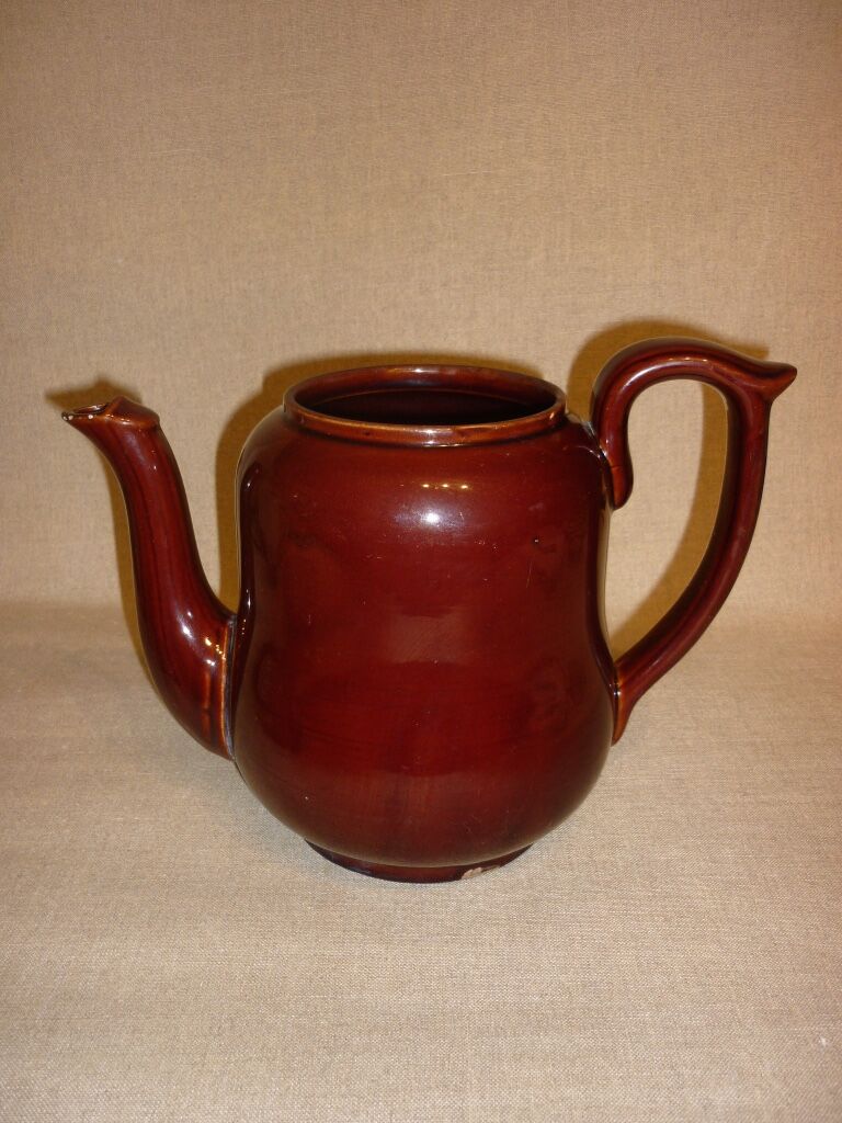 Very large brown ceramic coffee maker