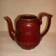 Very large brown ceramic coffee maker