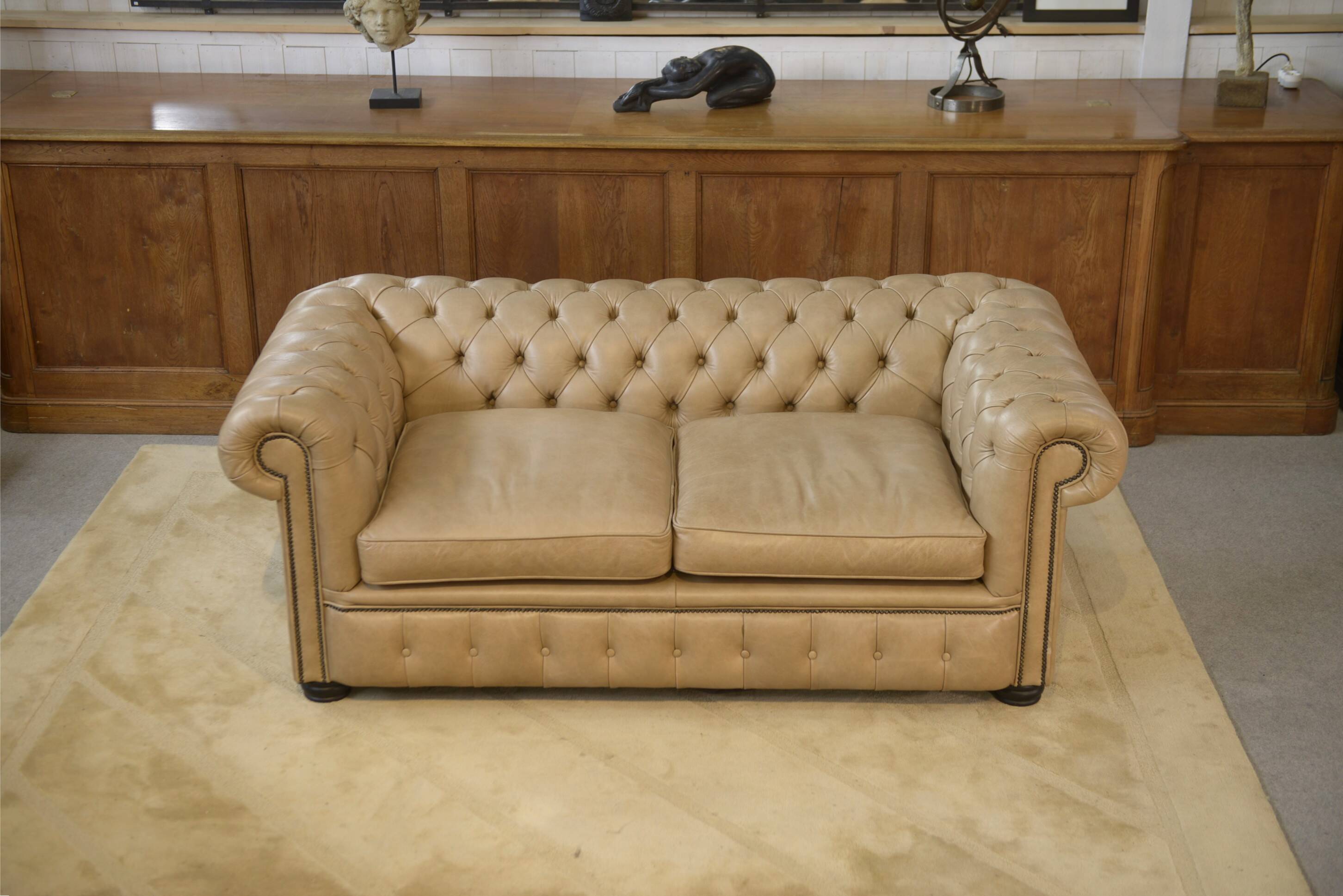 Beige leather Chesterfield sofa handmade in England.