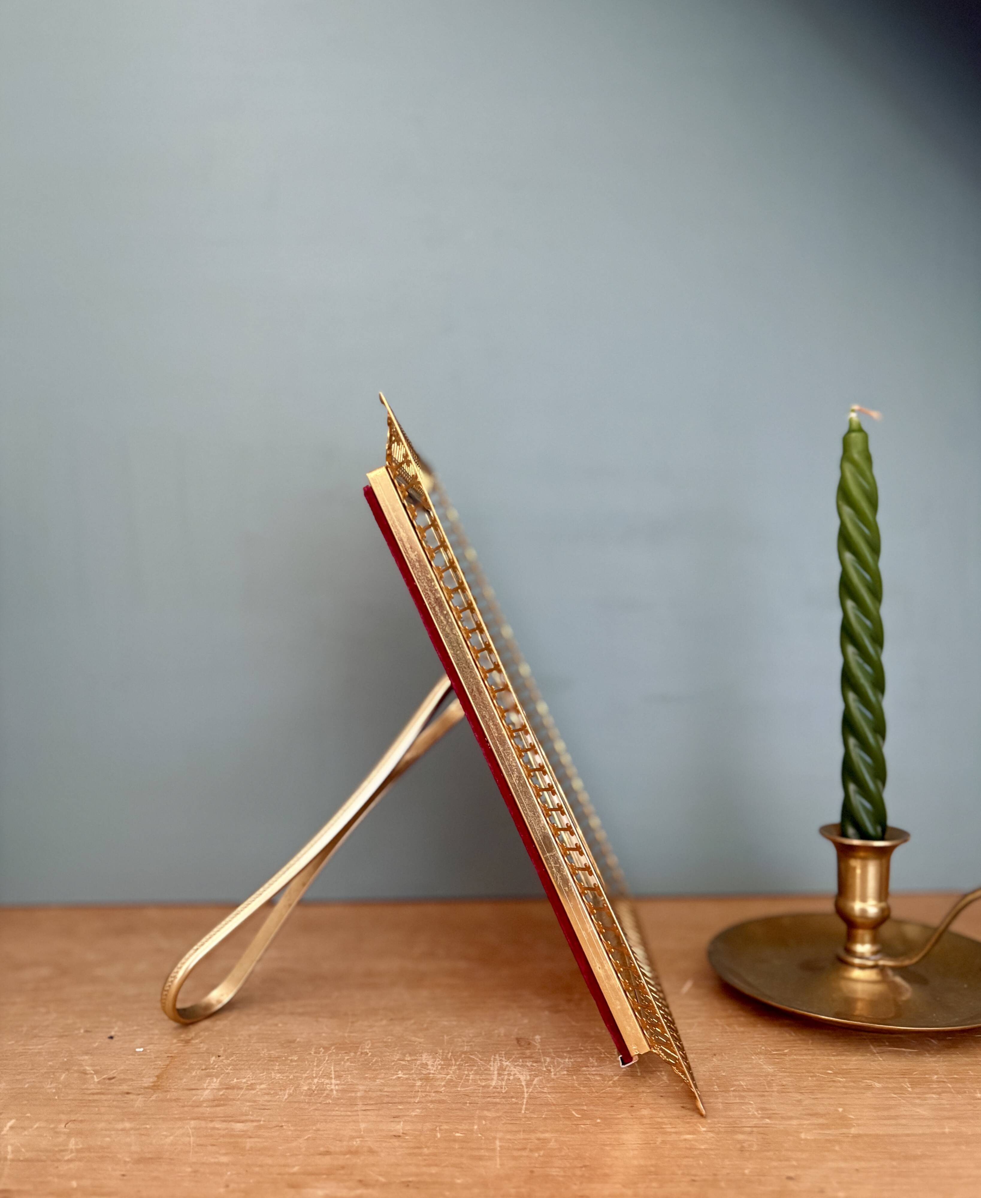 Antique gilt metal frame with flower engraving