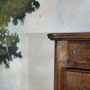 Small oak display cabinet with one door.
