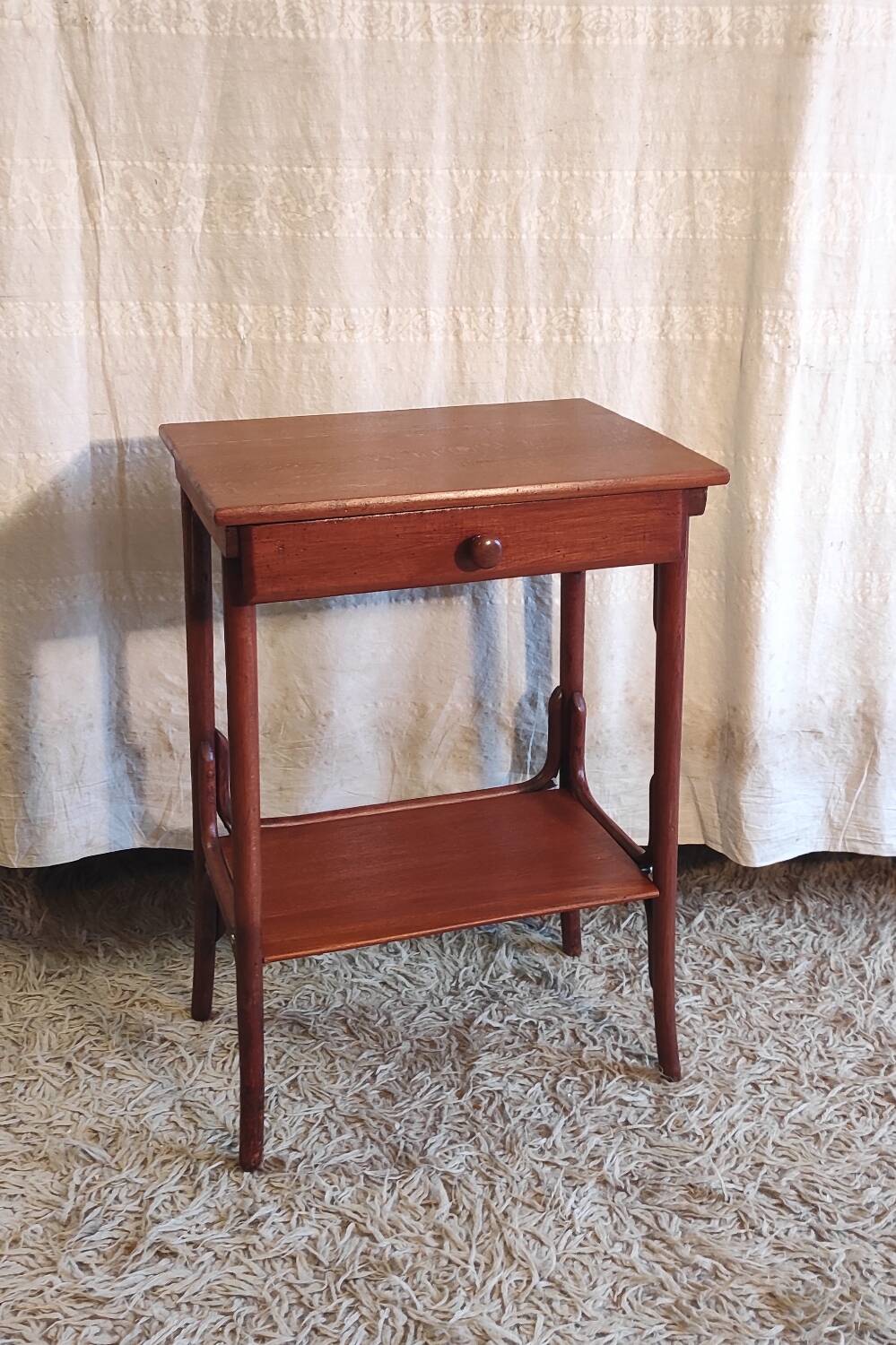 Curved solid wood side table - early 20th century