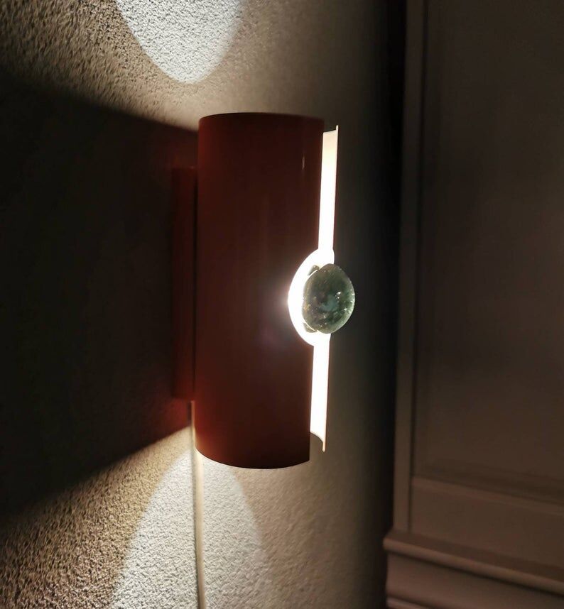 Raak Amsterdam orange wall applique from the 1970s