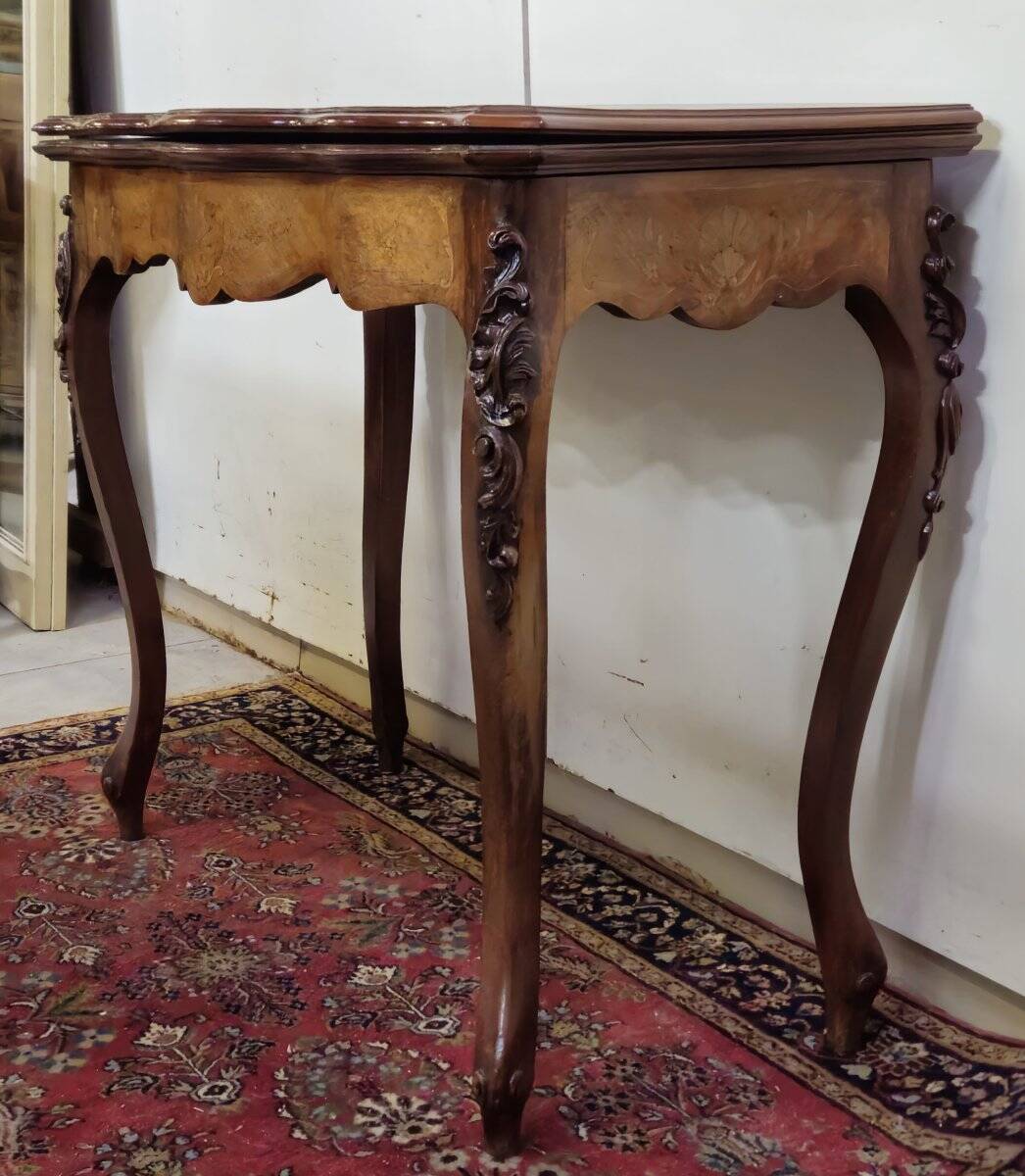 Louis XV style game table in marquetry and mahogany.