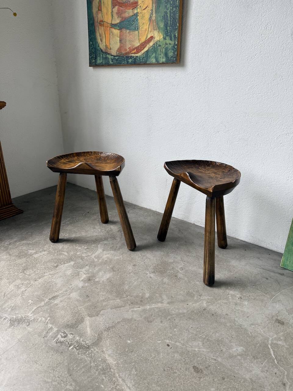 Pair of Le Selou tripod shepherd's stools