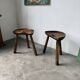 Pair of Le Selou tripod shepherd's stools