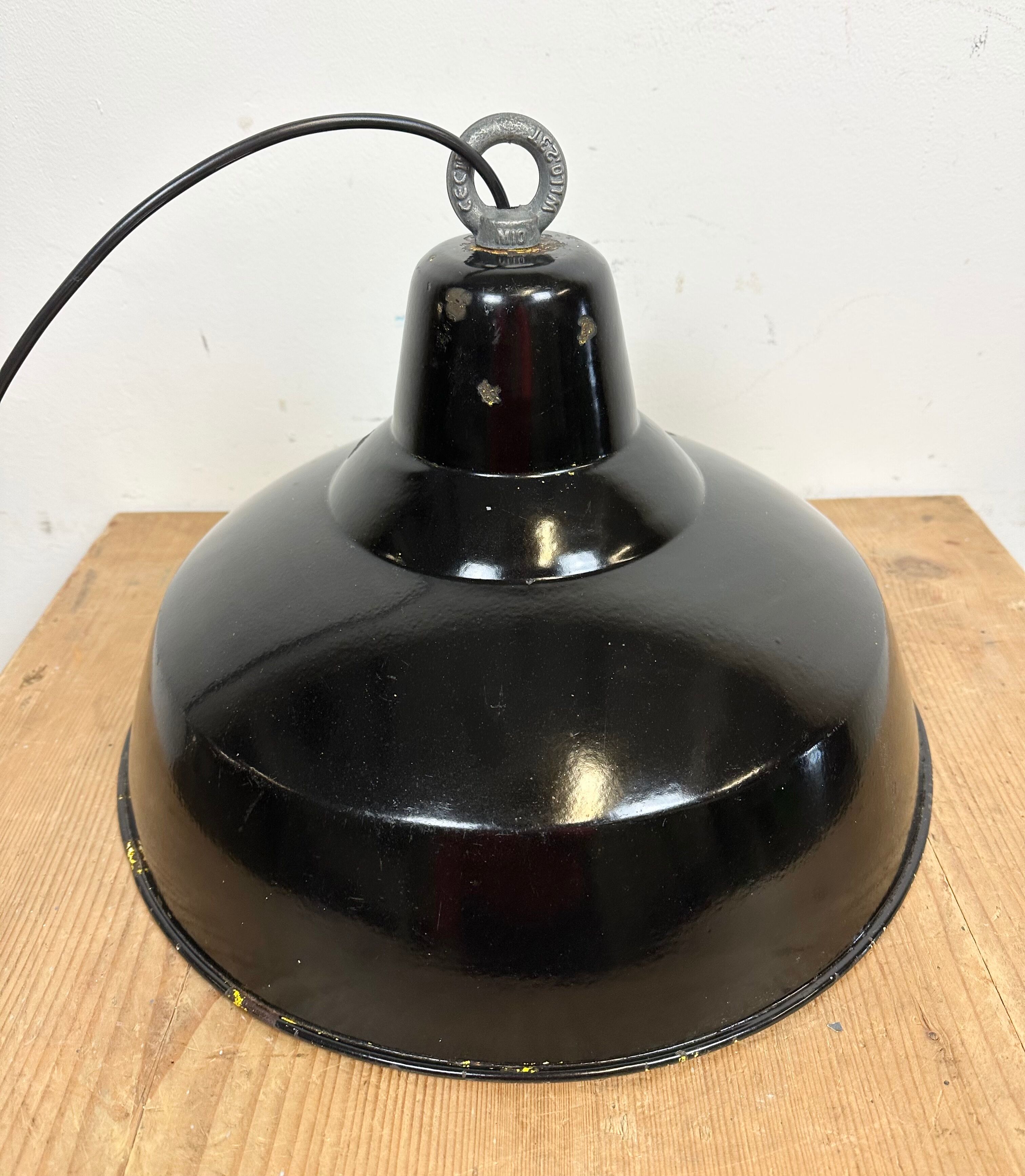 Industrial black enamel factory lamp with iron top, 1960s