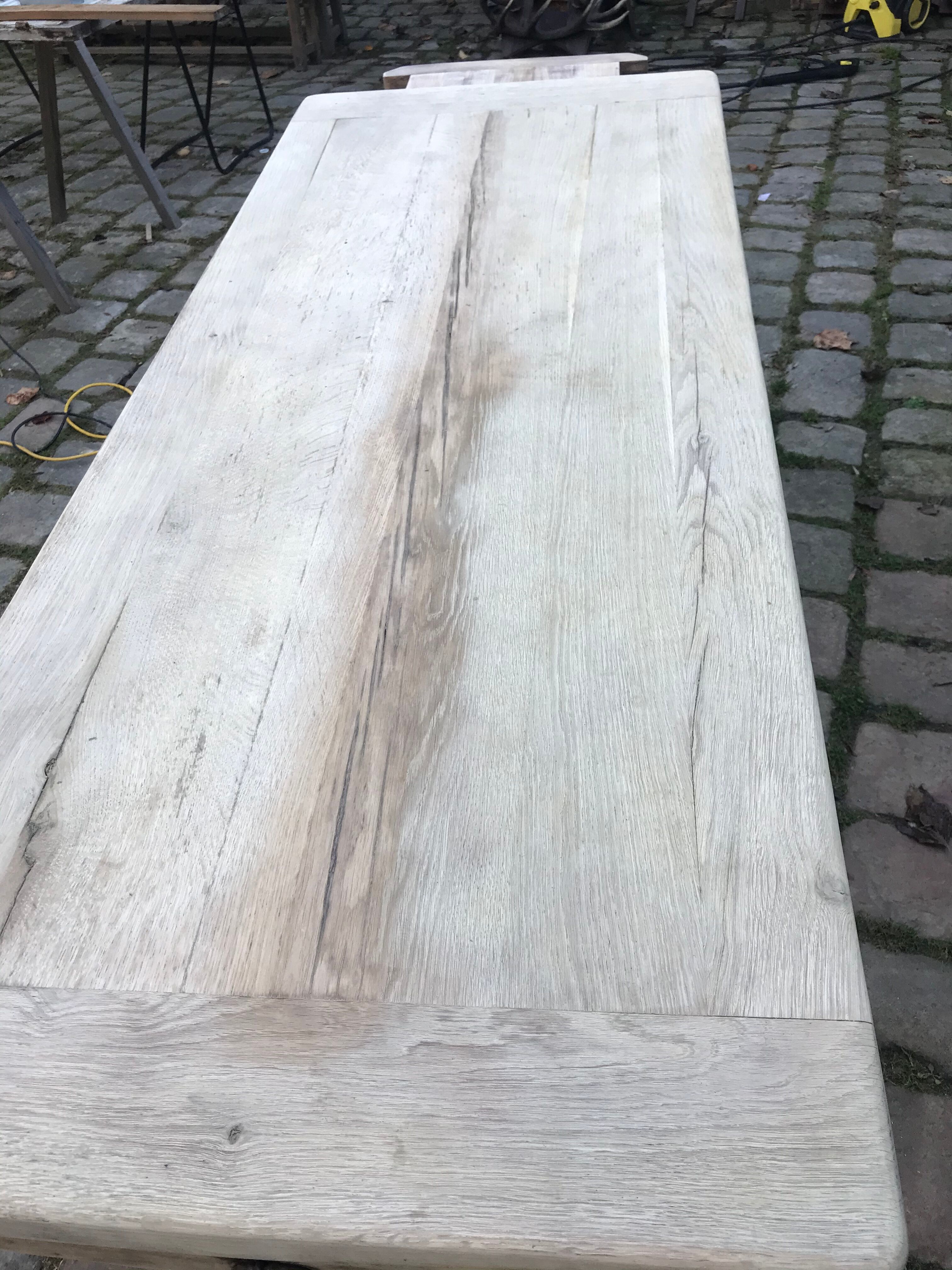 Lightened rustic stripped oak table