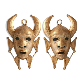 Pair of African brass masks, 70s