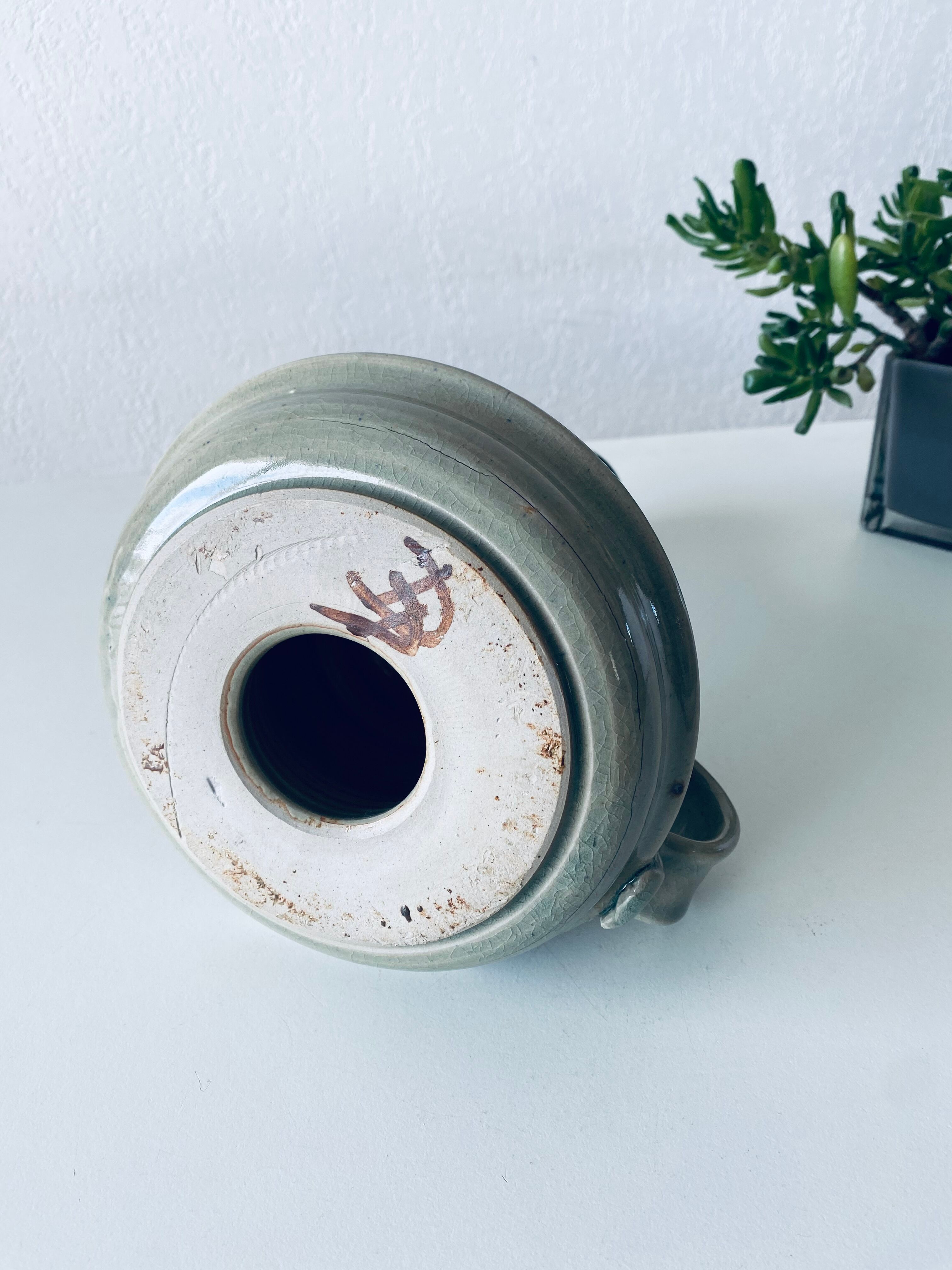 Candle holder in glazed ceramic