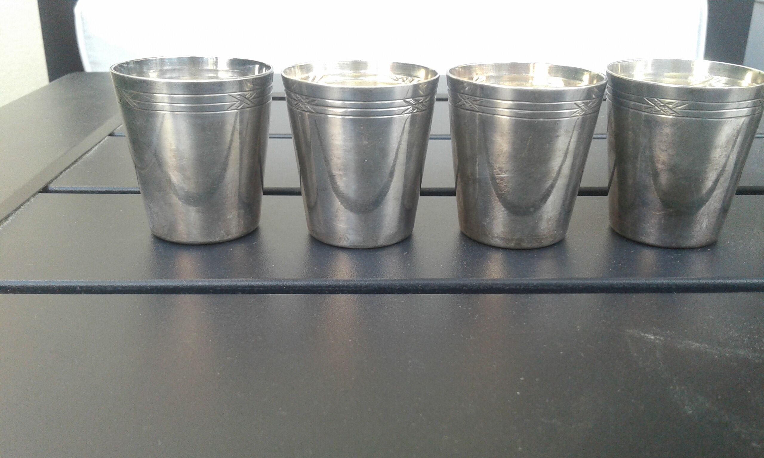 6 small silver glasses for brandy.