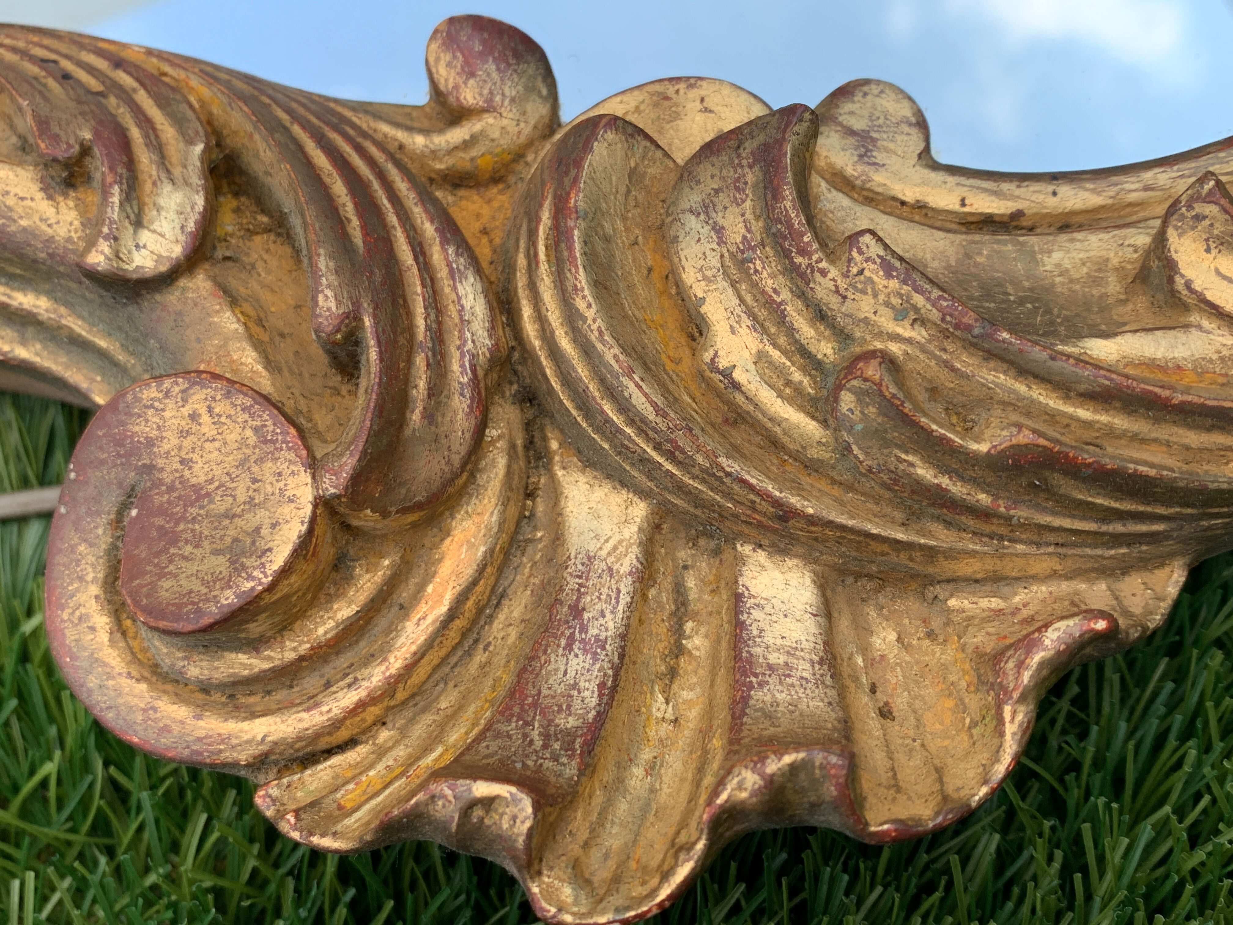 Old mirror in carved wood and gilded leaf, Louis XV rocaille style, twentieth century 59x87cm