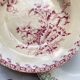 10 mismatched vintage soup plates in blue, green, and red ironstone