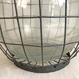 Demijohn and its metal basket