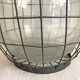 Demijohn and its metal basket