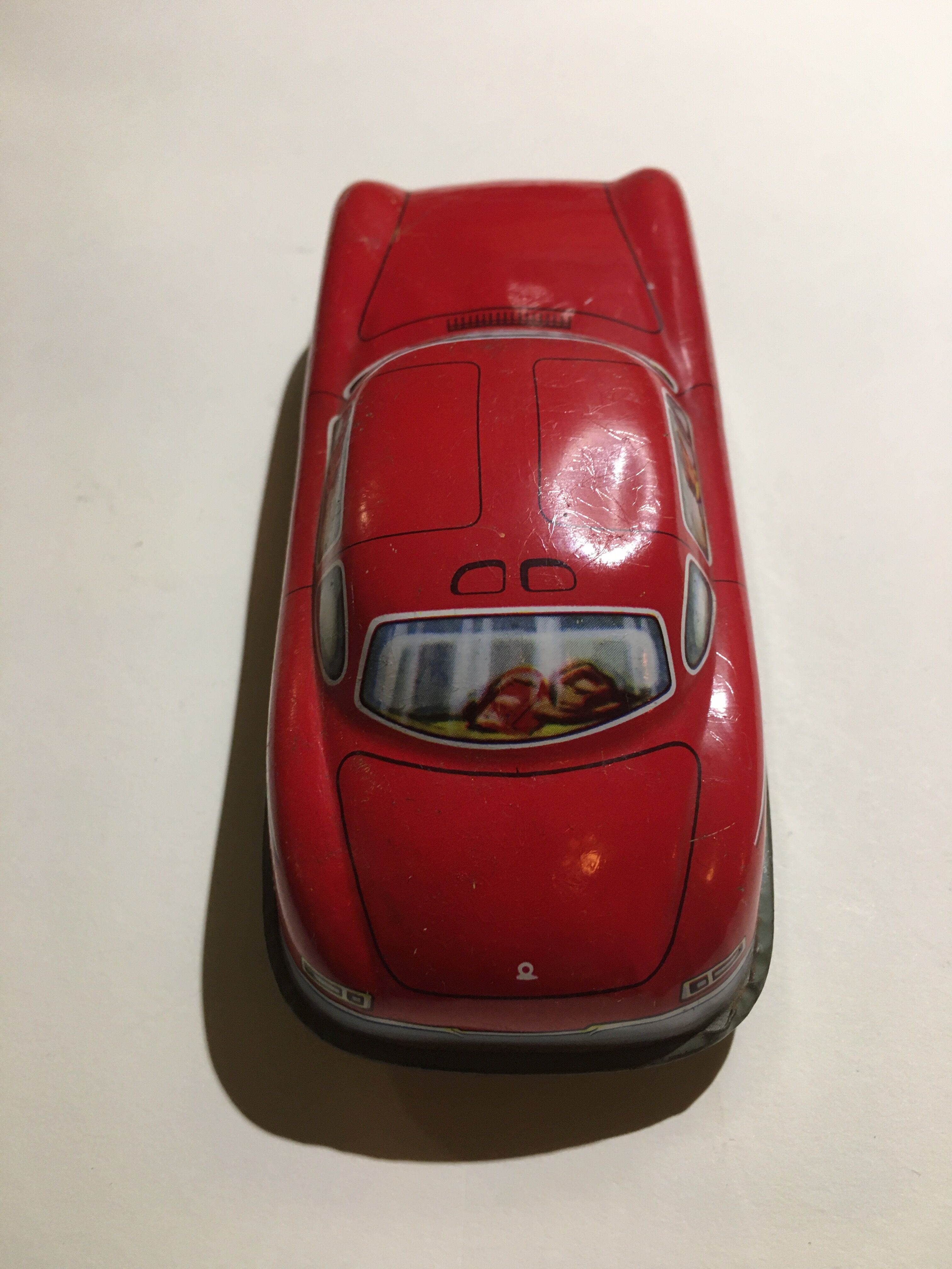 Mercedes miniature car in lithographed sheet metal