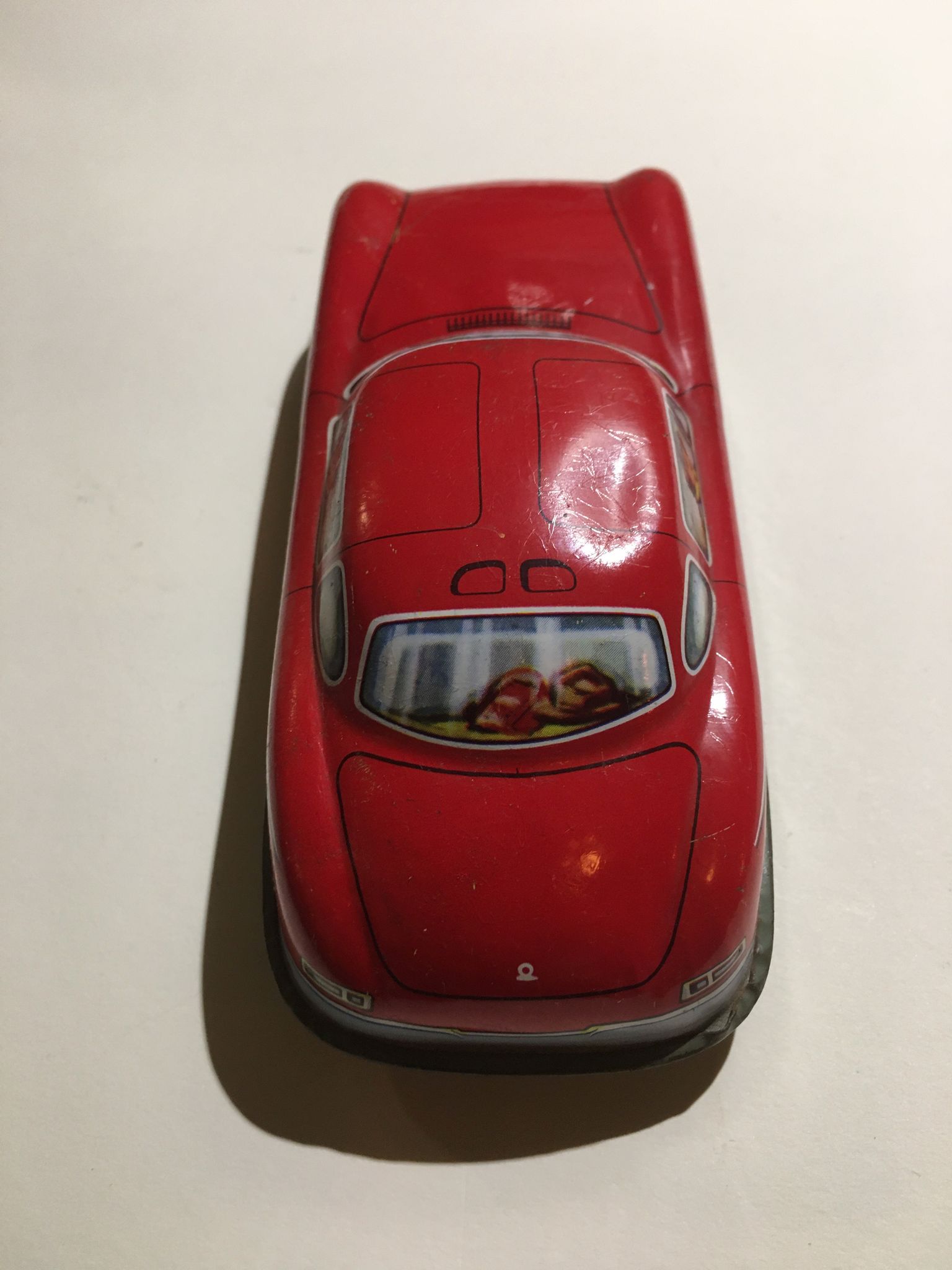 Mercedes miniature car in lithographed sheet metal