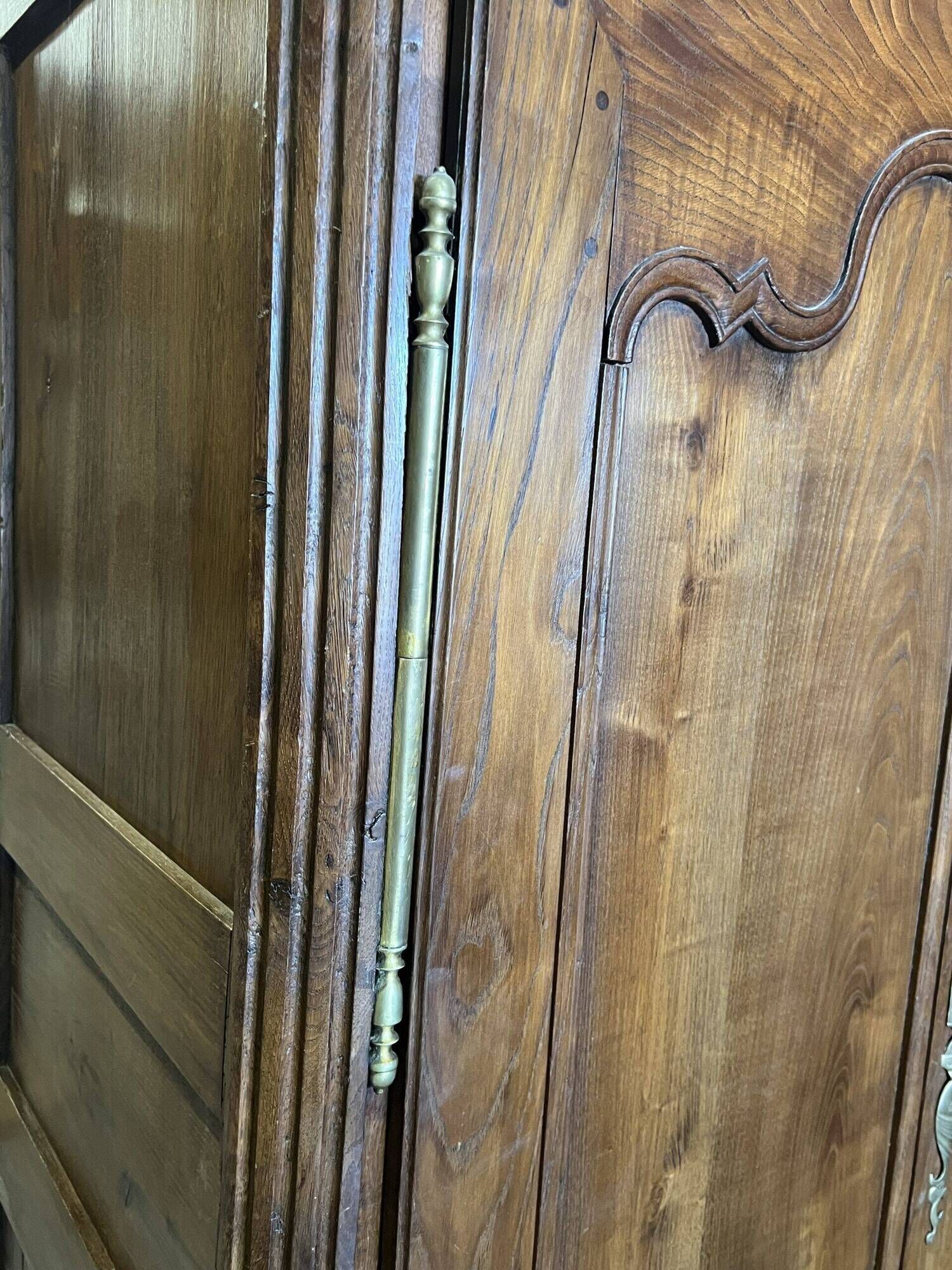 Very beautiful and old carved wooden wardrobe from the 19th century, small size, height 211 cm.