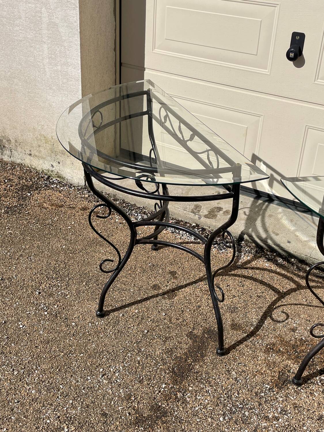 Glass and iron table with two side tables and 8 chairs