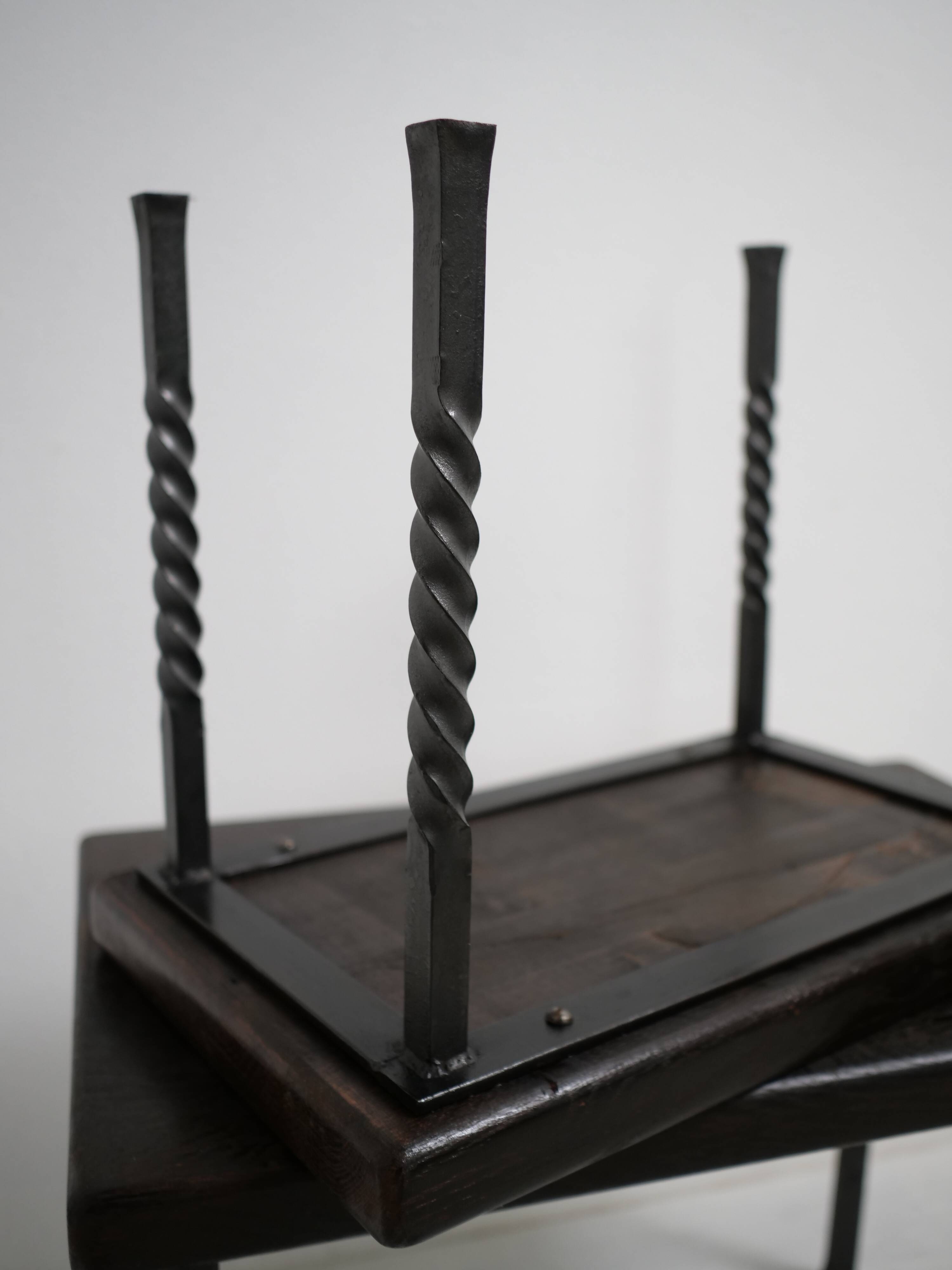Brutalist nesting table in ebonized oak and wrought iron