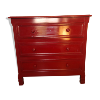 Commode vintage rouge en bois exotique