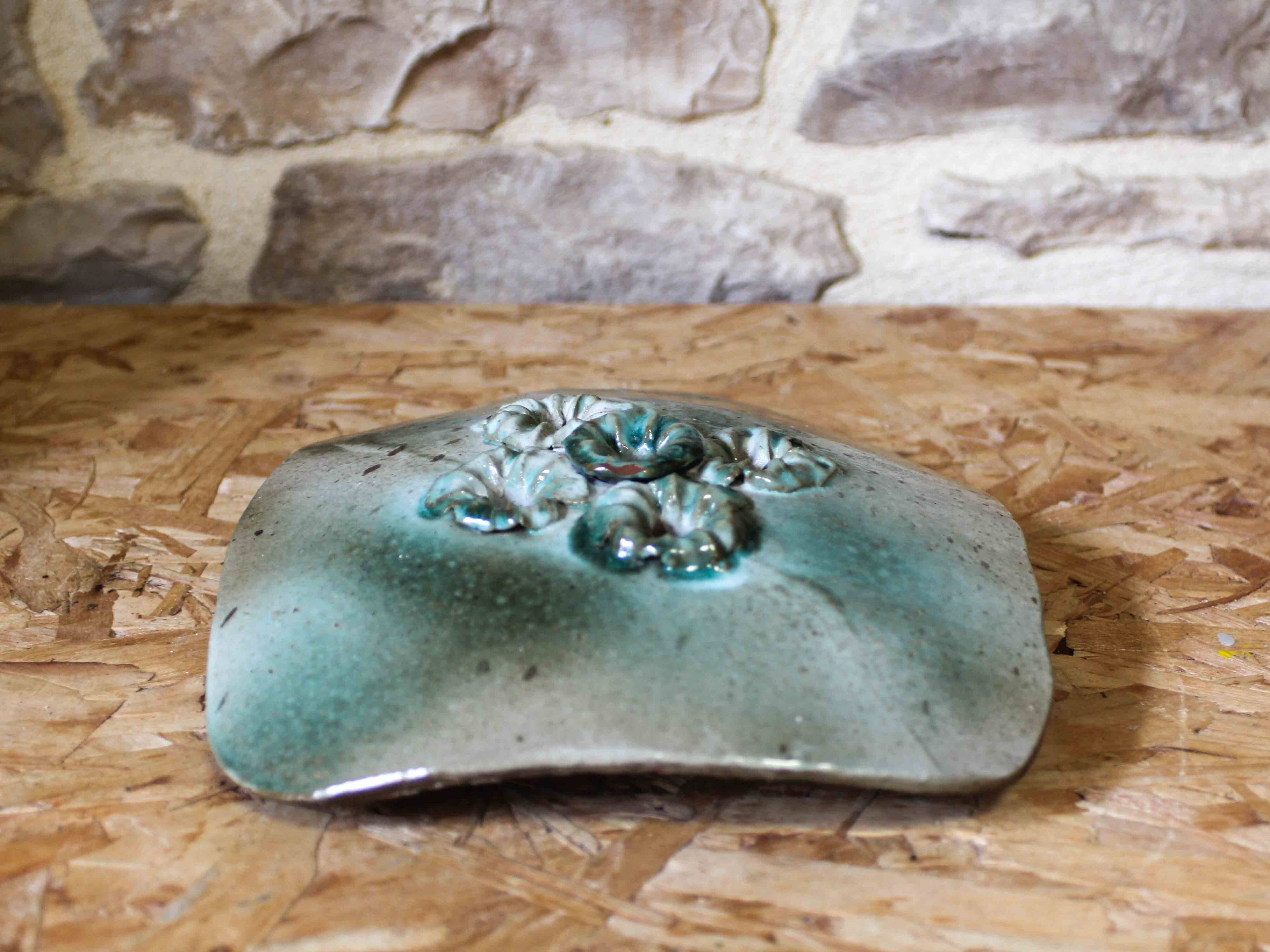 Ceramic flower holder