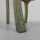 Dining chair upholstered with stamped tin
