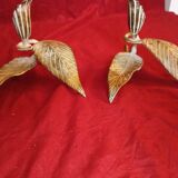 Pair of patina metal candle holders