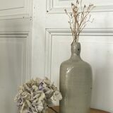 Old light grey ceramic bottle