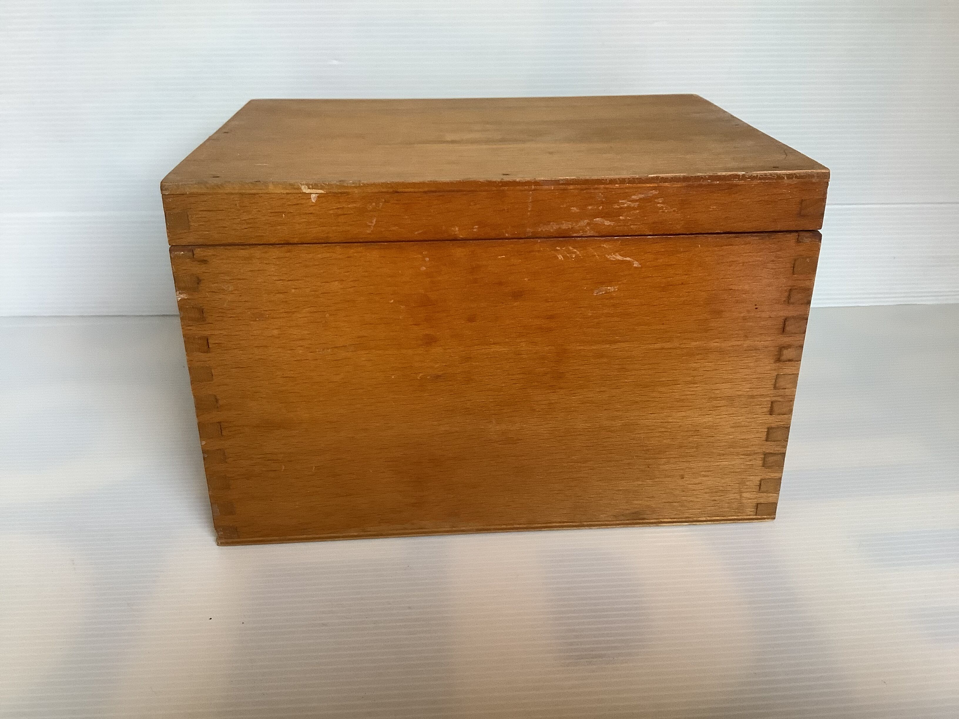 Wooden storage box dovetail mounting