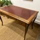 Louis XV style marquetry desk – antique leather top