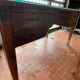 Double-sided administrative desk in oak.